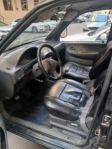 Kia Sportage: 1.7 l | 1996 il Ofrouder/SUV — 2