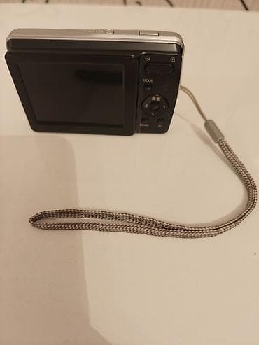 flas: Traveler DC 140 rəqəmsal fotoaparat Istifadə olunmuş fotoaparatdir — 3