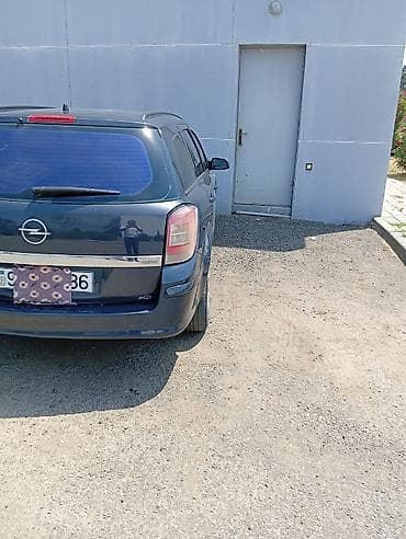 Opel Astra: 1.3 л | 2009 г. 440000 км Универсал — 4