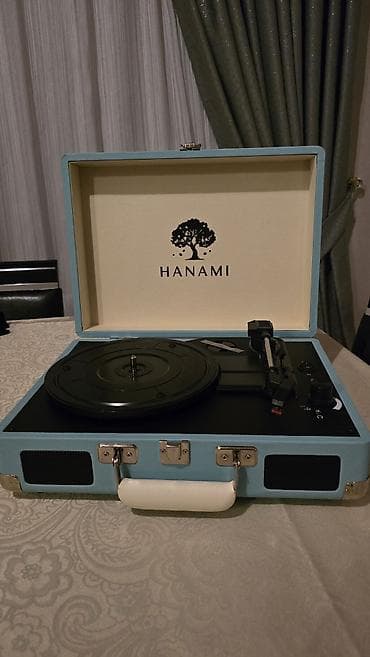 HANAMI portativ vinil pleyeri – çamadan tipli dizayn Xüsusiyyətlər: - — 7