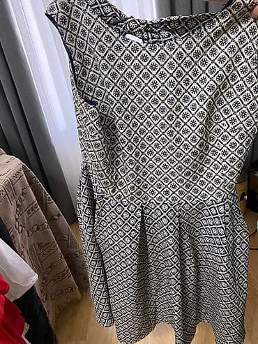 Qoluzsuz, dizə yaxın uzunluqda, qara-krem rəngli naxışlı qadın donu — 1