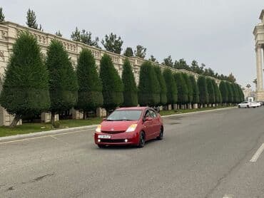 diskler r17: Toyota Prius (ikinci nəsil) – hibrid hetçbek - Rəng: qırmızı - Kuzov — 1