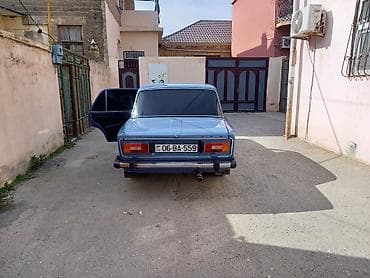 2106 salon: VAZ 2106 sedan - Kuzov: 4 qapılı klassik sedan, açıq-mavi rəng - — 6
