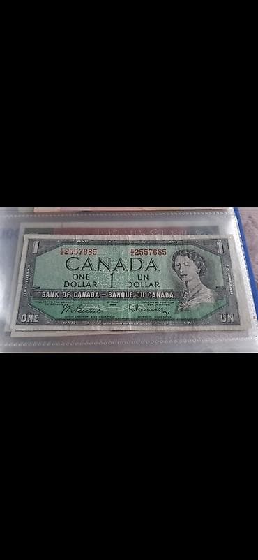 Tecili satılır Kolleksiya üçün Kanada 1 dollar banknotu - Ölkə
