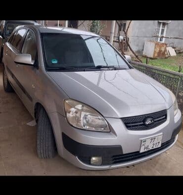 Математика: Model: Kia Rio (sedan), gümüşü rəng Kuzov: 4 qapı, aerodinamik — 4