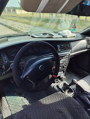 lezva diskler: Opel Vectra B sedan – tünd yaşıl rəng, 4 qapı, 5 yerlik rahat salona — 8