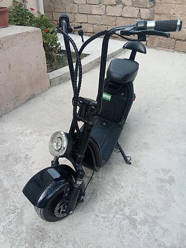on lip: Elektrikli skuter satılır. Qara rəngli, oturacaqlı və kompakt dizayna — 4