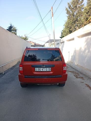 mercedes paxlava goz: Jeep Patriot, narıncı rəngli, 5 qapılı SUV. Xüsusiyyətlər: - — 5