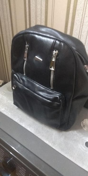 Velosiped ehtiyyat hissələri: Deriden olan debli rukzak.məktəb cantasi kimidə istifadə etmak olar — 2