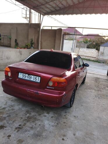 kia forte 2017: Kia Sephia: 1.6 l | 1998 il Sedan — 5