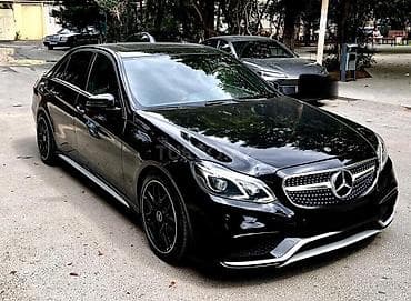 Mercedes-Benz E-Class sedan – AMG paketli, qara rəngli, elegan və