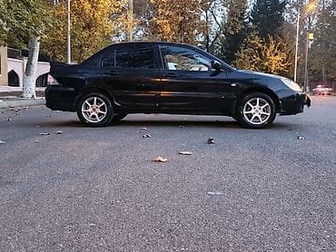 hyundai elantra teker: Mitsubishi Lancer: 1.6 l | 2005 il 290000 km Sedan — 2