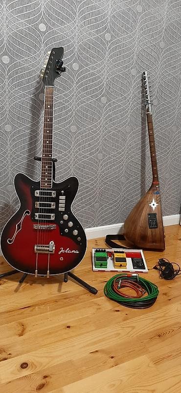 real gitara: Məhsul: Musiqi alətləri və əlavə avadanlıq dəsti Tərkib: - Jolana — 1