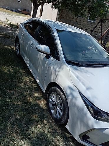 Avtomobil satışı: Toyota Corolla sedan - Kuzov: sedan, ağ rəng - Mühərrik və ötürmə — 5