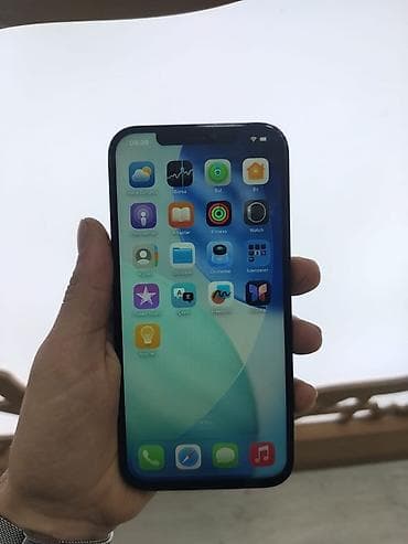 a 52 telefon: IPhone 12 Pro, Pacific Blue, Face ID — 1