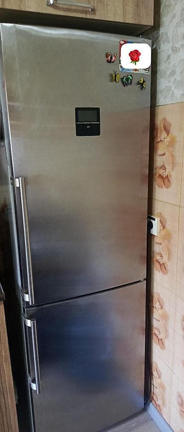 Paslanmayan poladdan korpuslu, iki qapılı soyuducu-dondurucu