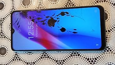телефон fly б: Itel smartfon - Rəng: mavi-yaşıl (şüalı teksturalı arxa qapaq) - Arxa — 2