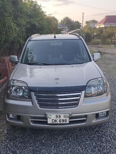 Nissan X-Trail: 2 l | 2004 il Universal