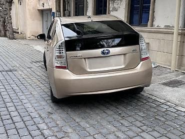 tap az prius: Toyota Prius (III nəsil) hibrid liftbek - Rəng: açıq qızılı/bej, qara — 7