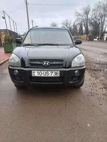 Hyundai Tucson, qara rəng, şəhər və uzun yol üçün rahat SUV. Texniki — 3
