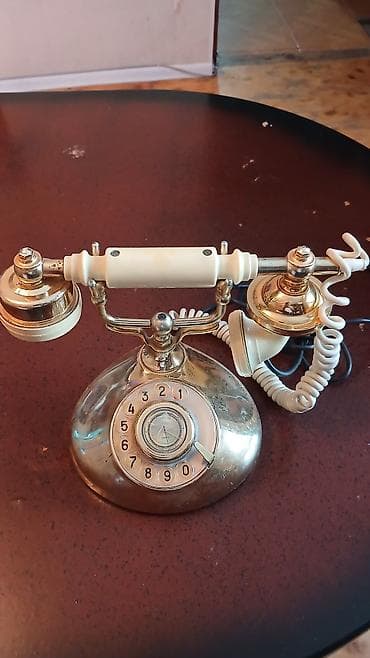 Stasionar telefon Simli