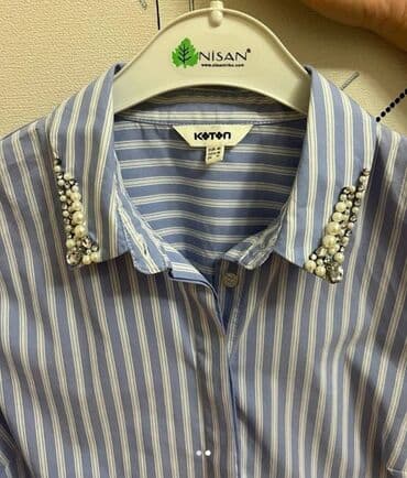 ağ qadın köynəyi: Vərəqləyin. Bluzka baha alınıb 2 dəfə geyilib.M-L uyğun 12 — 8