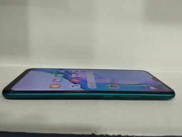 телефон fly cirrus 9: Xiaomi Redmi 9 (Aqua Green) - Ekran: 6.53" Full HD+ IPS, damla — 4