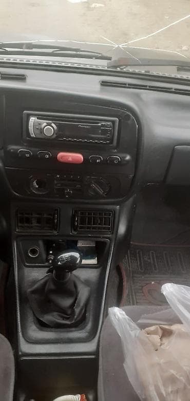 benzin filter: TOFAŞ Kartal İli 2005 Mator 1.6 Benzin ban növü Sedan Yürüyşü — 2