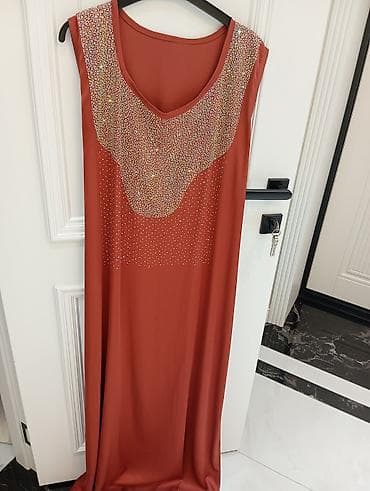 Abu Dhabiden alinib. Qırmızı-narıncı rəngdə, uzun kəsimli, qolsuz