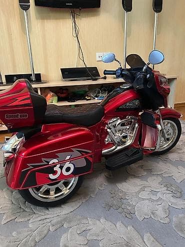 ucuz moto: Uşaq üçün elektrikli motosiklet – tək oturacaqlı kruizer tipli model — 1