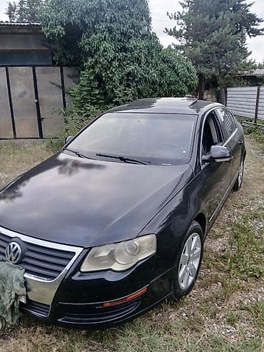 volqa ehtiyat hisseleri: Volkswagen Passat sedan. Avtomobilin salonu qara rəngdədir və ön — 6