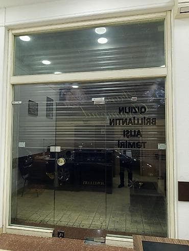 Магазинные двери Стекло