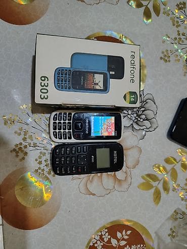 data modem sim card: - Model: Realfone 6303 (qutusu ilə) - Şəbəkə: Dual SIM - Ekran: rəngli — 1