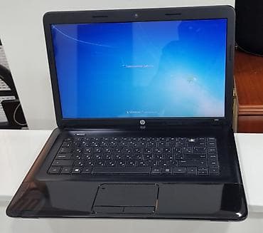 hp pavilion a4000: Noutbuk Hp 2000 işlək vəziyyətdə, adaptorla işləyir, bir düyməsi — 1
