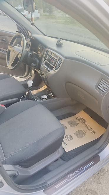 авто volkswagen: Kia Rio: 1.4 л | 2005 г. Хэтчбэк — 10