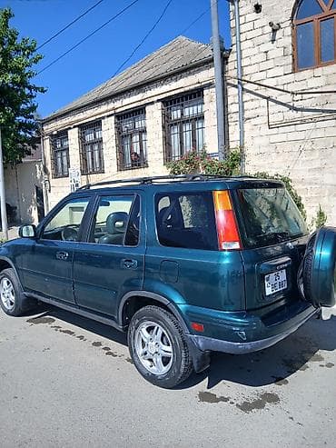baqaj: Honda CR‑V (1-ci nəsil) – yaşıl rəngli, 5 qapılı, şəhər və yüngül — 9