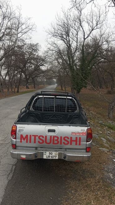mersedes qapi: Mitsubishi L200: 2.5 l | 2009 il 381810 km Pikap — 2