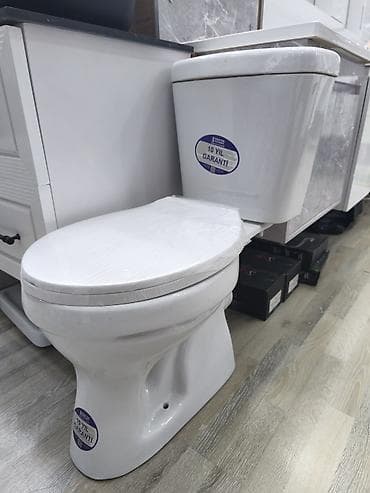 hamam dus: Ağ keramikadan iki hissəli unitaz dəsti (çən və kasa). Erqonomik — 1