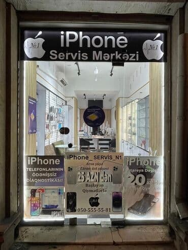 Telefon mağazasının içinde 3 vitrin arendiya verilir telefon satışı