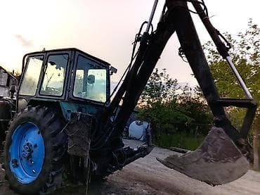 ucuz masınlar: Traktor ideal vəziyyətdədir. Tam işlək formada. Sənətdəri də tam — 10
