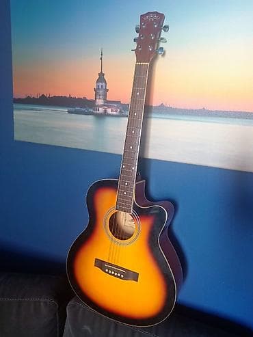 Гитары: Elektro-akustik gitara – cutaway korpuslu, sunburst rəng keçişli model — 1