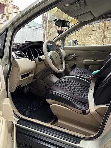 Nissan Tiida sedan – geniş və praktik daxili ilə şəhər və ailə