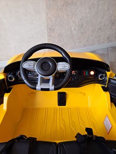 детский мотоцикл каталка: Uşaq üçün elektrikli ride-on avtomobil – sarı rəngdə sport kabriolet — 7