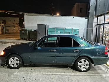 bmw e36 kuza: Mercedes-Benz C 180: 1.8 l | 1995 il Sedan — 3