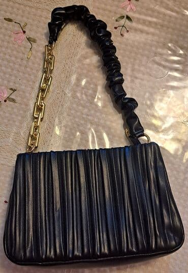 Çiyin çantası, İşlənmiş