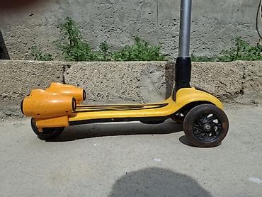dort teker motor: Uşaq skuterı – 3 təkərli, sarı-qara rəngdə Xüsusiyyətlər: - 3 təkərli — 2