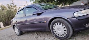 запчасти на опель вектра: Tünd göy rəngdə olan Opel Vectra sedanı. Bu avtomobil rahat və — 6