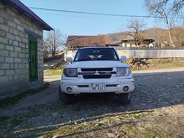 vossen diskleri: Mitsubishi Pajero iO GDI, ağ rəngdə kompakt off-road SUV — 2