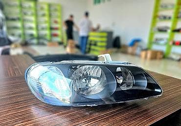 Nissan Sunny 2004 qara on faralari .Nissan Sunny 2004 qabaq sag ( sağ