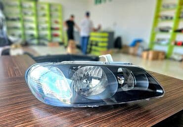 on fara: Nissan Sunny 2004 qara on faralari .Nissan Sunny 2004 qabaq sag ( sağ — 1